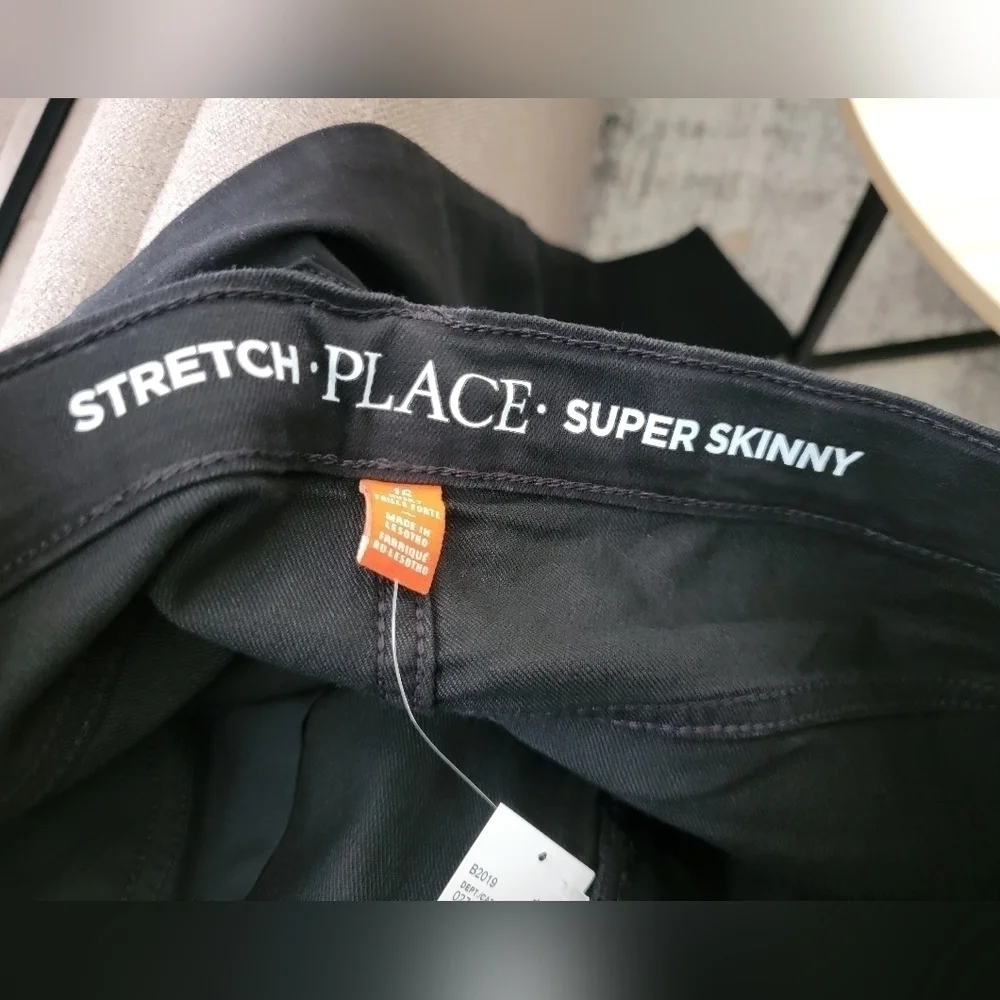 The children place Black super skinny jeans size 16 Husky.